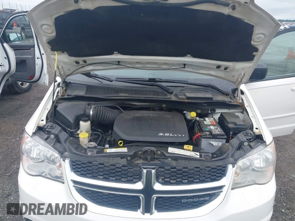 2012 Dodge Grand Caravan SE with VIN 2C4RDGBG8CR115003, listed as a IAAI auction lot 42217153 with 196,833 mi miles and . Bid and sale history available at DreamBid. Image 10.