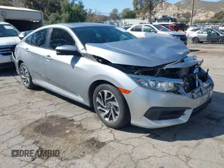 2018 Honda Civic Sedan EX with VIN 2HGFC2F79JH507818, listed as a IAAI auction lot 42001508 with 82,103 mi miles. Bid and sale history available at carsss.com. Image 1.