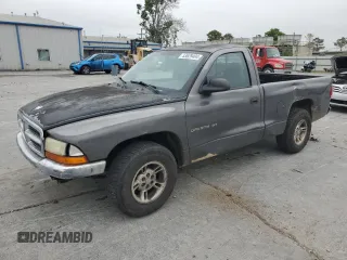 2002 Dodge Dakota z VIN 1B7FL46XX2S511526, wystawiony jako Copart lot #57955594 z przebiegiem 244 367 mil mil oraz Szkoda całkowita • Salvage title. Historia ofert i sprzedaży dostępna na DreamBid. Obrazek 1.