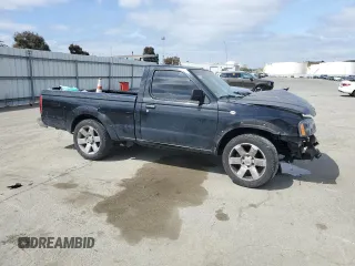 2001 Nissan Frontier XE with VIN 1N6DD21S71C335481, listed as a Copart auction lot 53393635 with 197,327 mi miles and Salvage title. Bid and sale history available at DreamBid. Image 4.