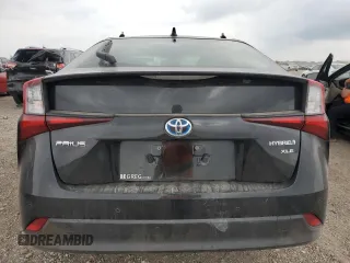 2022 Toyota Prius L Eco с VIN JTDKAMFU6N3160042, выставлен на аукционе Copart как лот 53633945 с пробегом 51 901 миль миль и Списание • Salvage title. История ставок и продаж доступна на DreamBid. Изображение 6.