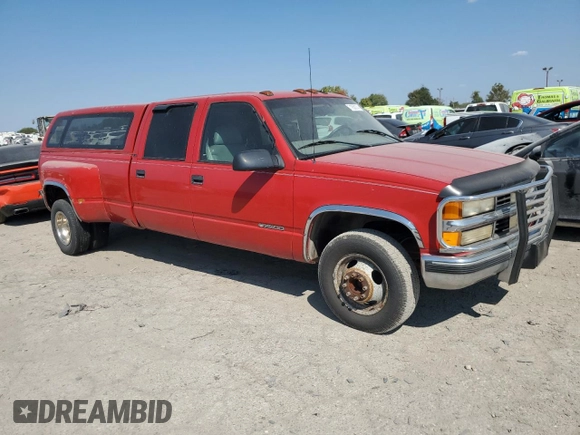 1999 Chevrolet Silverado 3500 z VIN 1GCHC33J3XF055520, wystawiony jako Copart lot #71958374 z przebiegiem 242 976 mil mil oraz Czysty tytuł • Clean title. Historia ofert i sprzedaży dostępna na DreamBid. Obrazek 4.