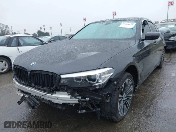 2019 BMW 5 Series 530e iPerformance with VIN WBAJA9C53KB399794, listed as a IAAI auction lot 41561874 with Not Provided miles. Bid and sale history available at carsss.com. Image 2.