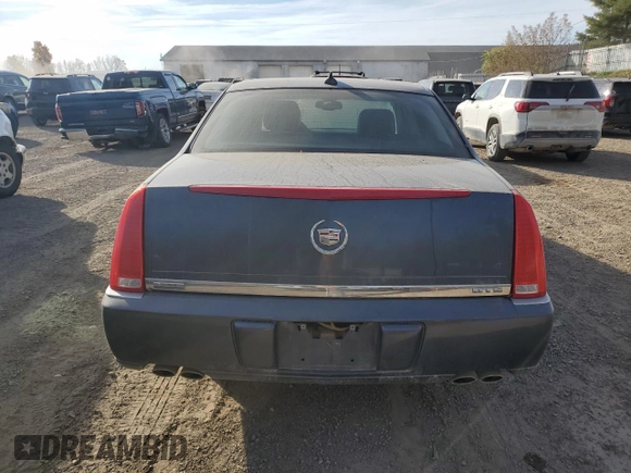 2009 Cadillac DTS 1SC z VIN 1G6KD57Y39U129722, wystawiony jako Copart lot #77071164 z przebiegiem 133 769 mil mil oraz Czysty tytuł • Clean title. Historia ofert i sprzedaży dostępna na DreamBid. Obrazek 6.