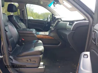 2015 Chevrolet Tahoe LTZ with VIN 1GNSKCKC8FR514671, listed as a IAAI auction lot 42157084 with 182,665 mi miles and . Bid and sale history available at DreamBid. Image 5.