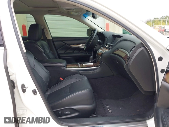 2015 Infiniti Q70 with VIN JN1BY1PP5FM601628, listed as a IAAI auction lot 41510075 with 102,363 mi miles and . Bid and sale history available at DreamBid. Image 5.