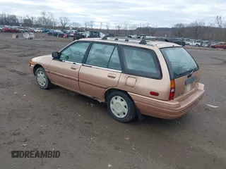 1994 Ford Escort z VIN 1FARP15J1RW106709, wystawiony jako IAAI lot #41768295 z przebiegiem 97 264 mil mil oraz . Historia ofert i sprzedaży dostępna na DreamBid. Obrazek 3.