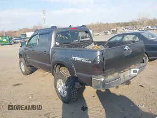 2014 Toyota Tacoma with VIN 3TMLU4EN3EM151545, listed as a IAAI auction lot 41821451 with 261,311 mi miles. Bid and sale history available at carsss.com. Image 3.