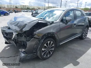 2019 Mazda CX-3 Grand Touring with VIN JM1DKDD71K1445905, listed as a IAAI auction lot 41674243 with 64,949 mi miles. Bid and sale history available at carsss.com. Image 2.