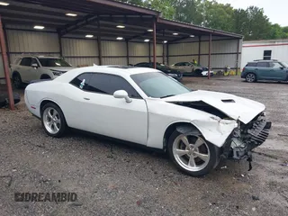 2015 Dodge Challenger SXT with VIN 2C3CDZAG2FH701634, listed as a IAAI auction lot 42242521 with 153,379 mi miles and . Bid and sale history available at DreamBid. Image 1.