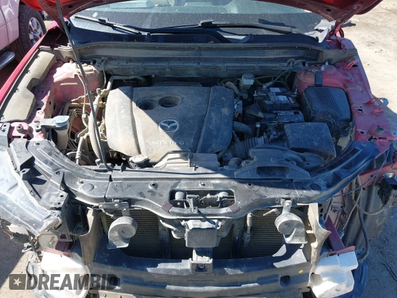 2020 Mazda CX-5 Grand Touring with VIN JM3KFADM3L0761286, listed as a IAAI auction lot 41715379 with 145,656 mi miles and . Bid and sale history available at DreamBid. Image 10.