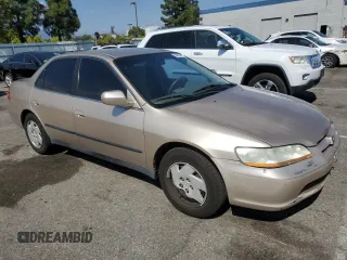 2000 Honda Accord LX z VIN 1HGCG1643YA089899, wystawiony jako Copart lot #54937555 z przebiegiem 196 596 mil mil oraz Szkoda całkowita • Salvage title. Historia ofert i sprzedaży dostępna na DreamBid. Obrazek 4.