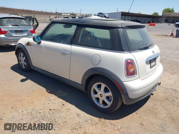 2010 MINI Hardtop with VIN WMWMF3C51ATZ23464, listed as a IAAI auction lot 42710259 with 124,660 mi miles and . Bid and sale history available at DreamBid. Image 3.