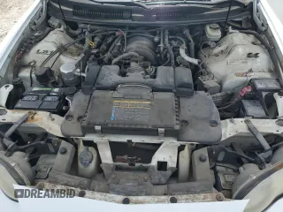 1999 Chevrolet Camaro Z28 z VIN 2G1FP22G1X2122217, wystawiony jako Copart lot #54150045 z przebiegiem 288 219 mil mil oraz Szkoda całkowita • Salvage title. Historia ofert i sprzedaży dostępna na DreamBid. Obrazek 11.