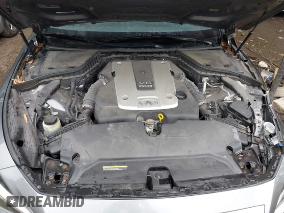 2015 Infiniti Q50 Premium z VIN JN1BV7ARXFM411040, wystawiony jako IAAI lot #41706295 z przebiegiem 97 297 mil mil oraz . Historia ofert i sprzedaży dostępna na DreamBid. Obrazek 10.