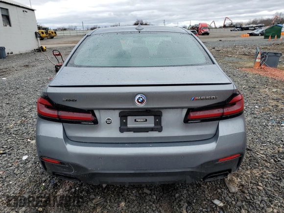 2023 BMW 5 Series M550i xDrive with VIN WBA13BK06PCN02733, listed as a Copart auction lot 48767235 with 27,725 mi miles and Salvage title. Bid and sale history available at DreamBid. Image 6.