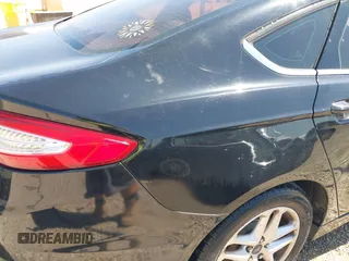 2016 Ford Fusion SE with VIN 3FA6P0HD3GR333466, listed as a IAAI auction lot 42034240 with 184,577 mi miles. Bid and sale history available at carsss.com. Image 6.