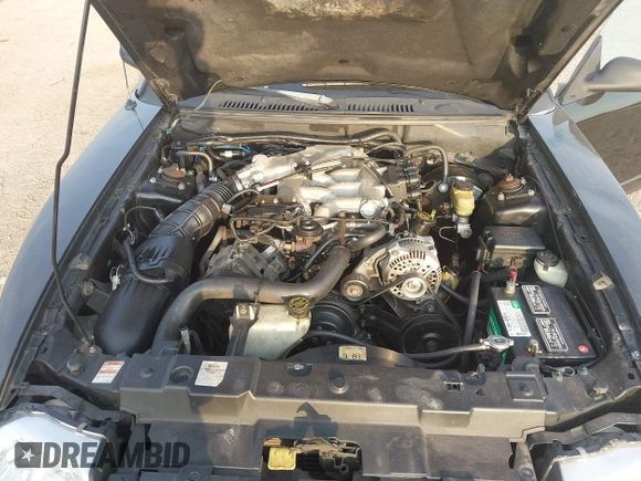 1999 Ford Mustang with VIN 1FAFP4047XF221818, listed as a IAAI auction lot 42261984 with 156,577 mi miles and . Bid and sale history available at DreamBid. Image 10.