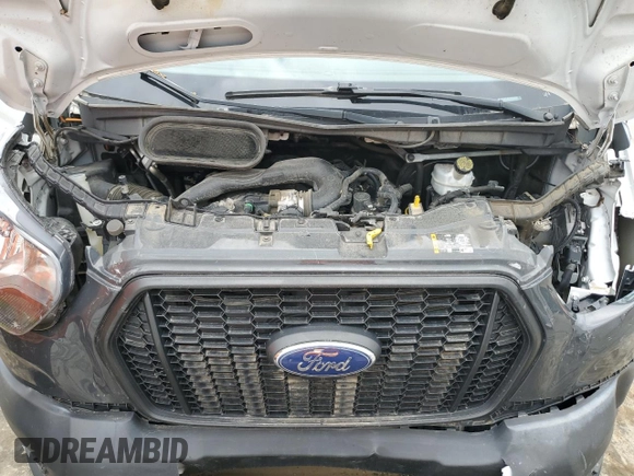 2021 Ford Transit Cargo с VIN 1FTBR1X87MKA53899, выставлен на аукционе Copart как лот 53969705 с пробегом 94 115 миль миль и Списание • Salvage title. История ставок и продаж доступна на DreamBid. Изображение 12.