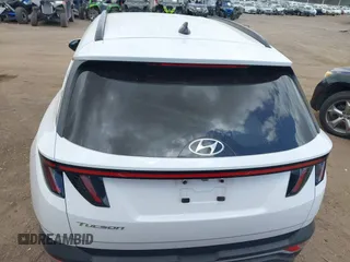 2022 Hyundai Tucson SEL z VIN 5NMJF3AE2NH062926, wystawiony jako IAAI lot #41969902 z przebiegiem 41 882 mil mil oraz . Historia ofert i sprzedaży dostępna na DreamBid. Obrazek 16.