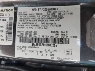 2017 Ford Fusion S with VIN 3FA6P0G70HR408265, listed as a IAAI auction lot 41978119 with 136,796 mi miles. Bid and sale history available at carsss.com. Image 9.