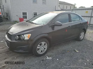 2015 Chevrolet Sonic LT with VIN 1G1JC5SH6F4116714, listed as a Copart auction lot 65743235 with 67,719 mi miles and Salvage title. Bid and sale history available at DreamBid. Image 1.