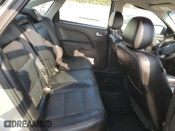 2007 Ford Five Hundred Limited z VIN 1FAHP25157G148342, wystawiony jako Copart lot #78499353 z przebiegiem 144 175 mil mil oraz Szkody całkowita. Historia ofert i sprzedaży dostępna na DreamBid. Obrazek 6.