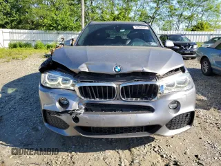 2015 BMW X5 xDrive35i z VIN 5UXKR0C57F0K61171, wystawiony jako Copart lot #57555405 z przebiegiem 119 664 mil mil oraz Szkoda całkowita • Salvage title. Historia ofert i sprzedaży dostępna na DreamBid. Obrazek 5.
