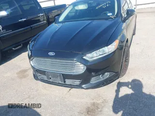 2014 Ford Fusion SE with VIN 3FA6P0HD4ER390773, listed as a IAAI auction lot 42088373 with 265,001 mi miles and . Bid and sale history available at DreamBid. Image 6.