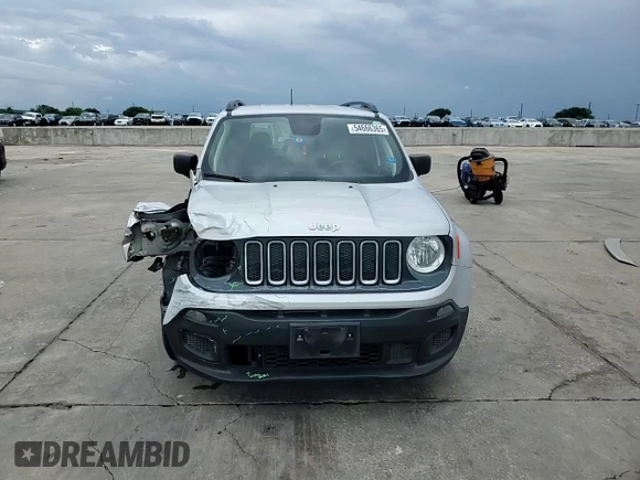 2018 Jeep Renegade Sport with VIN ZACCJAAB4JPG90198, listed as a Copart auction lot 54666365 with 100,561 mi miles and Salvage Title. Bid and sale history available at DreamBid. Image 14.