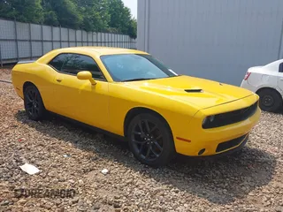 2019 Dodge Challenger SXT z VIN 2C3CDZAGXKH508867, wystawiony jako IAAI lot #42398632 z przebiegiem 124 851 mil mil oraz . Historia ofert i sprzedaży dostępna na DreamBid. Obrazek 1.