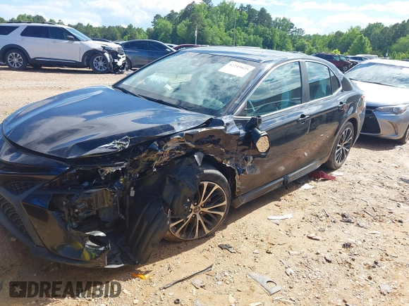 2018 Toyota Camry LE z VIN 4T1B11HKXJU652275, wystawiony jako IAAI lot #42245625 z przebiegiem 49 596 mil mil oraz . Historia ofert i sprzedaży dostępna na DreamBid. Obrazek 19.
