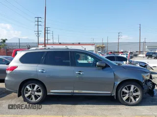 2015 Nissan Pathfinder Platinum with VIN 5N1AR2MN8FC693981, listed as a IAAI auction lot 42145556 with 161,142 mi miles and . Bid and sale history available at DreamBid. Image 14.