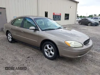 2003 Ford Taurus SE Standard z VIN 1FAFP53U93A100961, wystawiony jako IAAI lot #42332144 z przebiegiem 196 990 mil mil oraz . Historia ofert i sprzedaży dostępna na DreamBid. Obrazek 1.