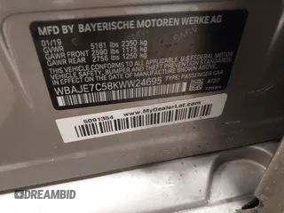 2019 BMW 5 Series 540i xDrive with VIN WBAJE7C58KWW24695, listed as a IAAI auction lot 41346095 with 65,374 mi miles and . Bid and sale history available at carsss.com. Image 9.