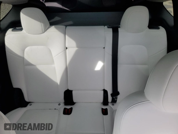 2024 Tesla Model Y Long Range с VIN 7SAYGDEE5RF983771, выставлен на аукционе Copart как лот 86153274 с пробегом 4 105 миль миль и Списание • Salvage title. История ставок и продаж доступна на DreamBid. Изображение 10.