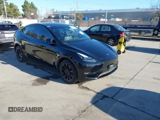 2024 Tesla Model Y Long Range with VIN 7SAYGDEEXRF983040, listed as a IAAI auction lot 41555332 with 79,506 mi miles and . Bid and sale history available at DreamBid. Image 1.