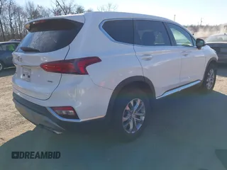 2019 Hyundai Santa Fe SE with VIN 5NMS2CAD5KH011357, listed as a IAAI auction lot 40918980 with 98,851 mi miles. Bid and sale history available at carsss.com. Image 4.
