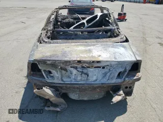 2005 BMW 3 Series 325Ci z VIN WBABW33465PL39123, wystawiony jako Copart lot #59957275 z przebiegiem Nie podano mil oraz Nie do naprawy • Non repairable. Historia ofert i sprzedaży dostępna na DreamBid. Obrazek 6.