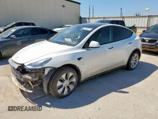 2022 Tesla Model Y Long Range z VIN 7SAYGDEE0NA009994, wystawiony jako Copart lot #53729575 z przebiegiem Nie podano mil oraz Szkoda całkowita • Salvage title. Historia ofert i sprzedaży dostępna na DreamBid. Obrazek 1.