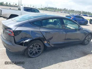 2023 Tesla Model 3 with VIN 5YJ3E1EA3PF623114, listed as a IAAI auction lot 41710385 with 31,663 mi miles and . Bid and sale history available at carsss.com. Image 6.