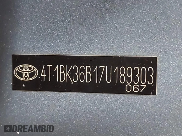 2007 Toyota Avalon XL z VIN 4T1BK36B17U189303, wystawiony jako IAAI lot #41614917 z przebiegiem 238 114 mil mil oraz . Historia ofert i sprzedaży dostępna na DreamBid. Obrazek 17.