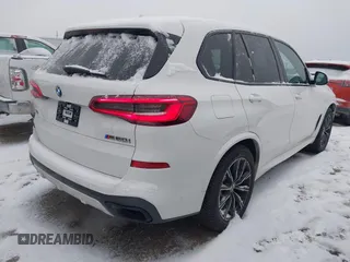 2020 BMW X5 M50i with VIN 5UXJU4C09LLE45658, listed as a IAAI auction lot 41307154 with 69,936 mi miles and . Bid and sale history available at DreamBid. Image 4.
