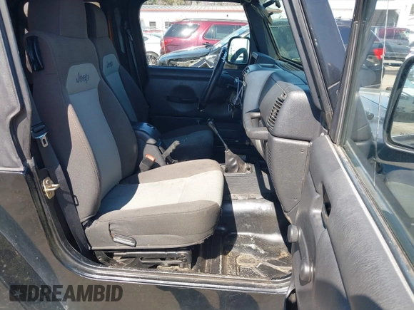 2005 Jeep Wrangler X with VIN 1J4FA39S35P372731, listed as a IAAI auction lot 41875121 with 146,034 mi miles and . Bid and sale history available at DreamBid. Image 5.