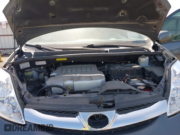 2009 Toyota Sienna XLE with VIN 5TDBK22C69S027767, listed as a IAAI auction lot 42029832 with 200,752 mi miles and . Bid and sale history available at DreamBid. Image 10.