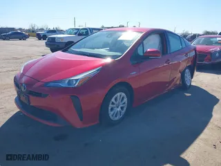 2022 Toyota Prius L Eco with VIN JTDKAMFU0N3161557, listed as a IAAI auction lot 41760623 with 135,934 mi miles. Bid and sale history available at carsss.com. Image 2.