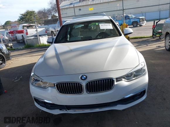 2016 BMW 3 Series 328i with VIN WBA8E9G58GNT47869, listed as a IAAI auction lot 41594120 with 57,561 mi miles. Bid and sale history available at carsss.com. Image 12.