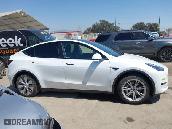 2023 Tesla Model Y Long Range z VIN 7SAYGDEE5PA104635, wystawiony jako IAAI lot #41989014 z przebiegiem 15 347 mil mil oraz . Historia ofert i sprzedaży dostępna na DreamBid. Obrazek 13.