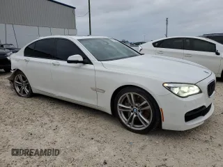 2013 BMW 7 Series 750i with VIN WBAYA8C54DC996569, listed as a Copart auction lot 74199774 with 107,871 mi miles and Salvage Title. Bid and sale history available at DreamBid. Image 4.