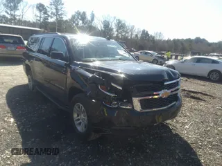 2019 Chevrolet Suburban LT with VIN 1GNSCHKCXKR405939, listed as a IAAI auction lot 41591475 with 106,554 mi miles and . Bid and sale history available at DreamBid. Image 1.